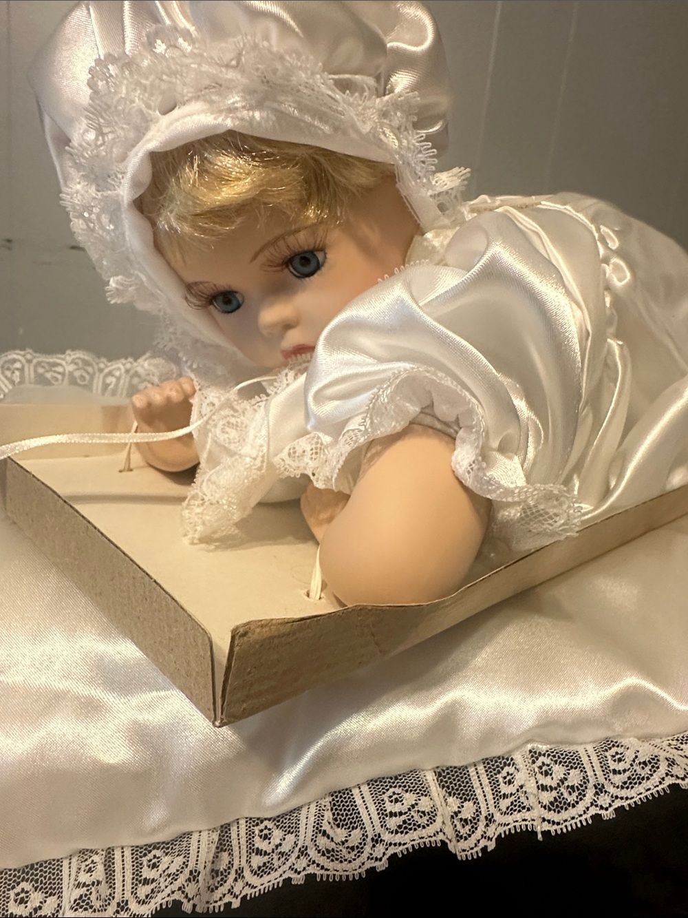 Porcelain Baby Doll in White Satin Christening Gown